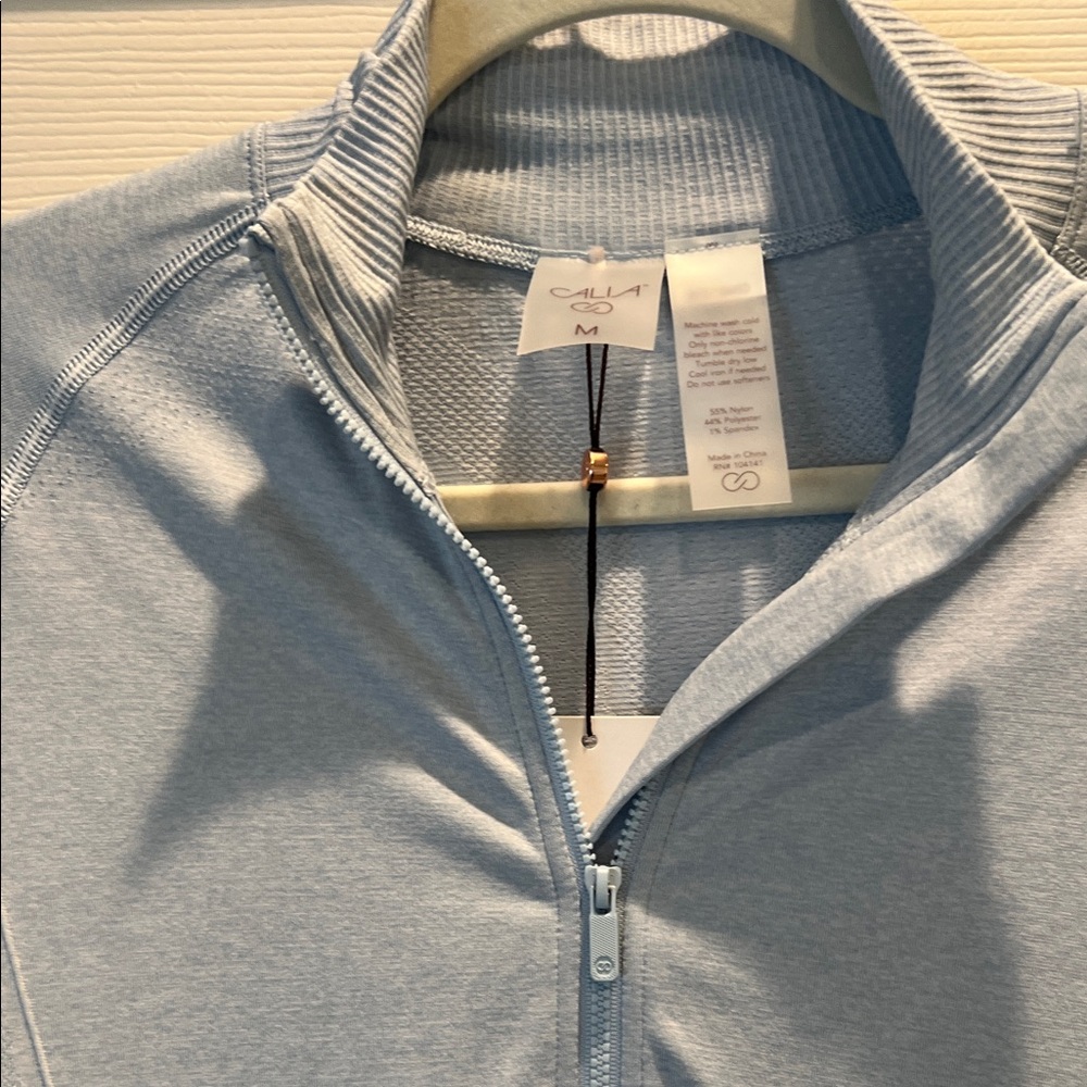 CALIA by Carrie Underwood Light Blue Golf Pullover - Picture 11 of 11